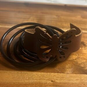 1 leather butterfly bracelet & 6 black plastic bangles